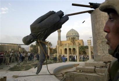 The toppled statue of Saddam Hussein is seen in in Firdos Square downtown Baghdad in this April 9, 2003 file photo. (AP Photo/Jerome Delay/File) 
